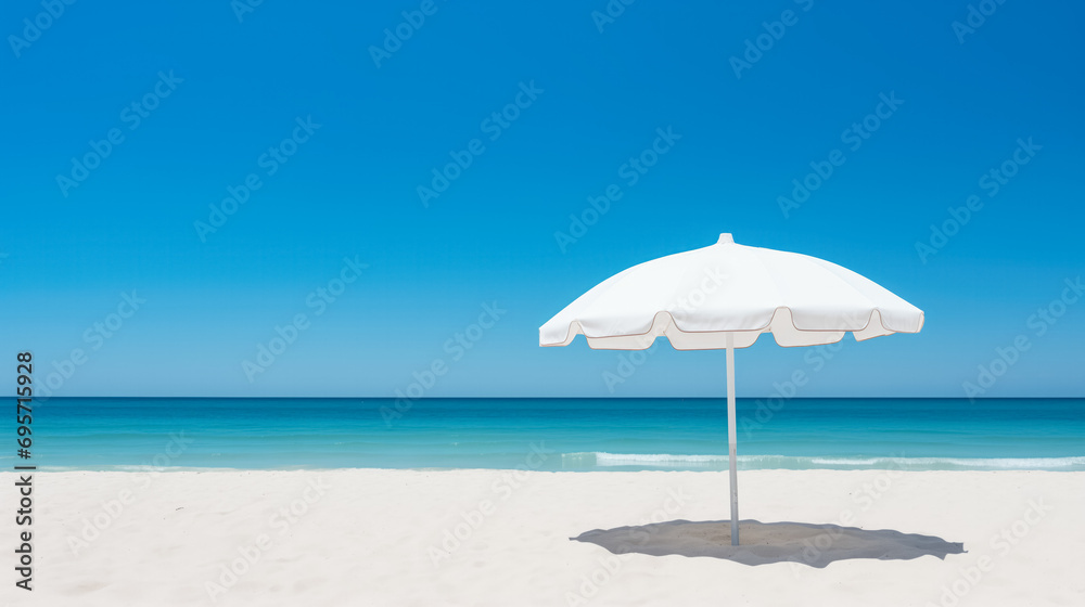Single Beach Umbrella Providing Shade on Gleaming White Sands with Ample Copy Space on a Sunny Day Background