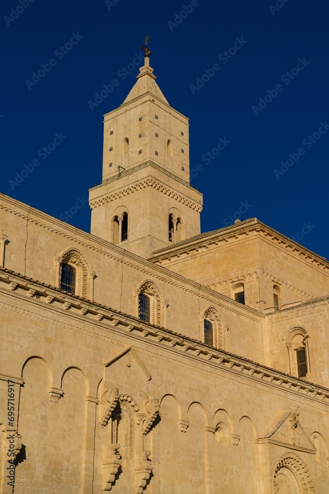 view of the historic Maratea Cathedral under a deep blue sky
