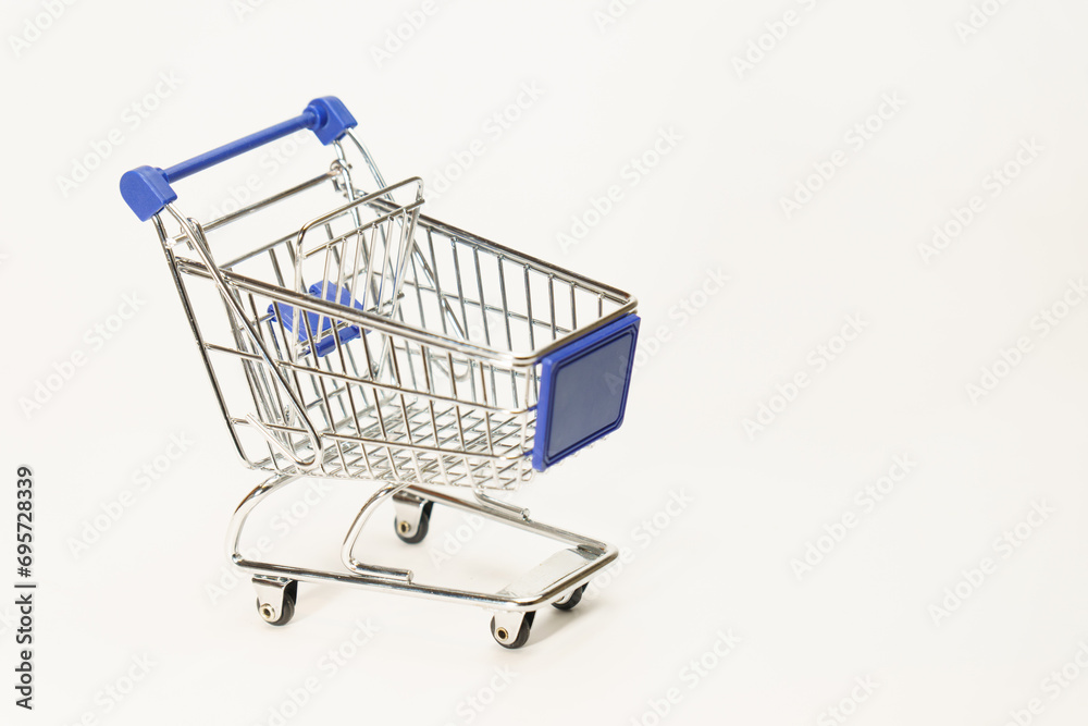 metal shopping cart with wheels, empty, isolated on white background metal shopping cart with wheels, empty, isolated on white background