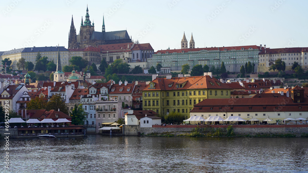 Czech Republic, Prague, September 2023: View from Charles Bridge to Prague Castle, the Vltava River, St. Vitus Cathedral. Concept - tourism, travel.