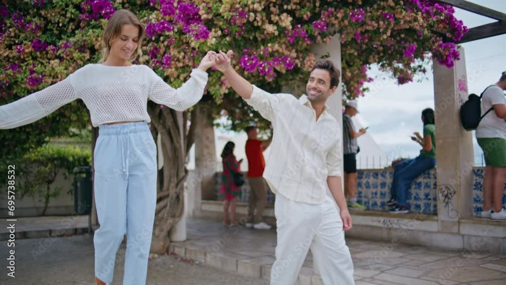 Dating pair strolling greenery city date. Love man woman holding hands at park