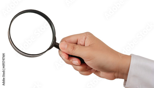 Hand holding a magnifying glass - isolated on transparent background photo