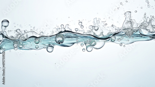 Closeup of water splash and tiny bubbles isolated on white background. Fresh water with bubbles.