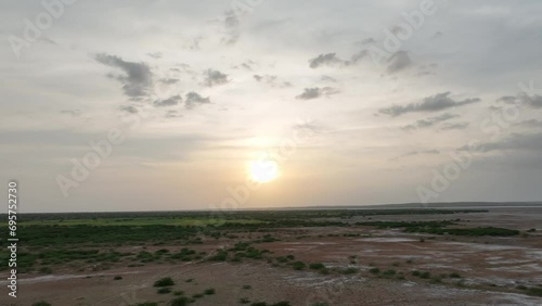 Nagarparkar at sunset rural open field landscape close to Mithi, Sindh, Pakistan photo