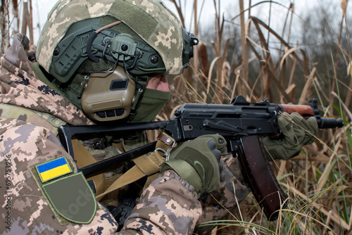 Ukrainian soldier with a machine gun