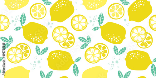 Seamless pattern with lemons, whole, slices. Fruit citrus print for textiles, kitchen, packaging. Vector graphics. photo
