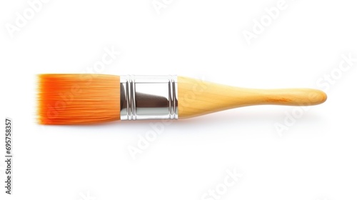 Paint brush with wooden handle on a white surface. Suitable for art and design projects