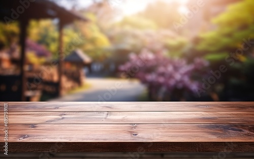 The empty wooden table top with blur background of Kyoto city