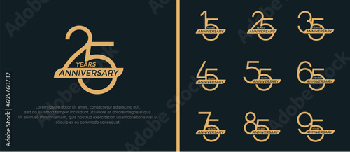 set of anniversary logo flat golden color and ribbon on black background for celebration moment photo