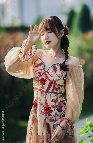 portrait of an asian young woman in the garden