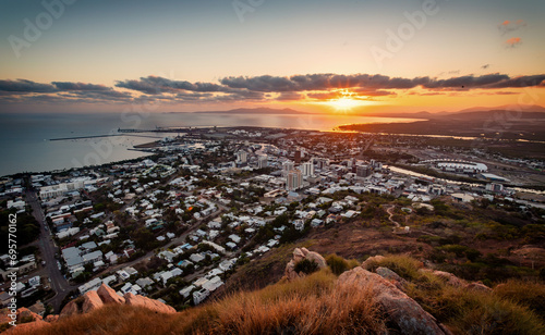 A panorama view of the city of Townsville in the sunrise from the Castle Hill Lookout