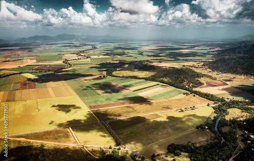 The countryside view of the regional Queensland near the Airlie Beach town from helicopter