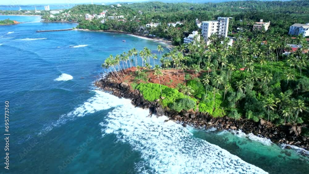 Beautiful Indian Ocean coastline on the island of Sri Lanka, Mirissa. Top view, aerial video filming. Beautiful Indian Ocean coastline on the island of Sri Lanka, Mirissa. Top view, aerial video filming.