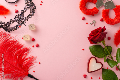 Embrace passion with adult boutique finds. Top view intimate essentials—lace mask, dice game, furry handcuffs, feather tickler, red rose, candle, sprinkles on soft pink backdrop, text-friendly space