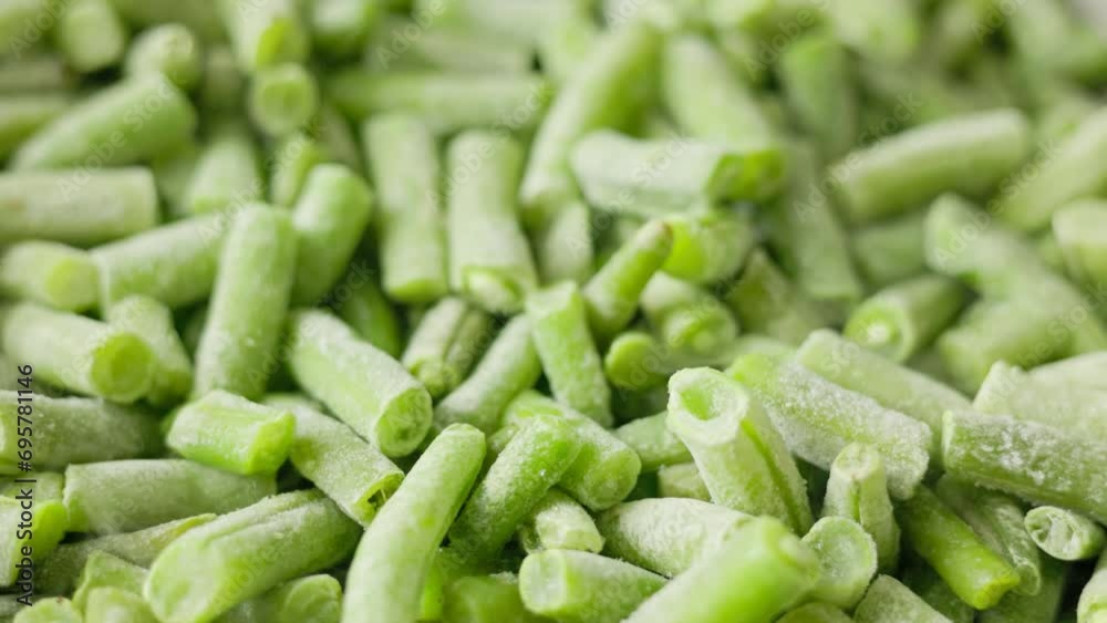 frying green beans on skillet, full-frame closeup view with selective focus. frying green beans on skillet, full-frame closeup view with selective focus.