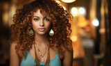 Portrait of Radiant Curly-Haired Woman with Exquisite Jewelry in Warm Ambient Light