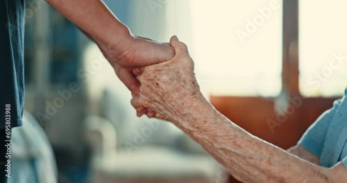 Closeup, senior person and holding hands with caregiver for support, care and empathy in retirement. People, nurse and patient with consultation, counselling and kindness with help in nursing home photo