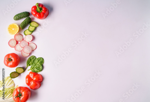 Flat lay of different vegetables on white background, copy space. Food concept.