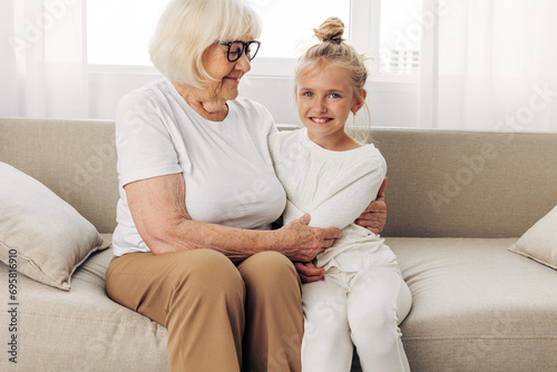 Granddaughter grandmother girl couch child