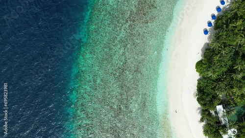 Tropical Island Paradise - Malahini Kuda Bandos, Maldives: Aerial drone reef flyover photo