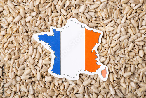 Flag of France in sunflower grain. Growing sunflowers in France, origin of grain concept