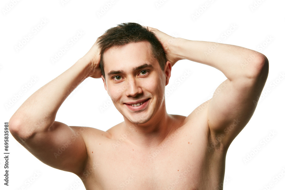 Portrait of shirtless young brunette man showing his healthy hair without furfur against white background. Concept of beauty treatment and hygiene, body care, anti-aging procedures. Copy space.