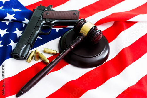 Gavel with gun over USA flag