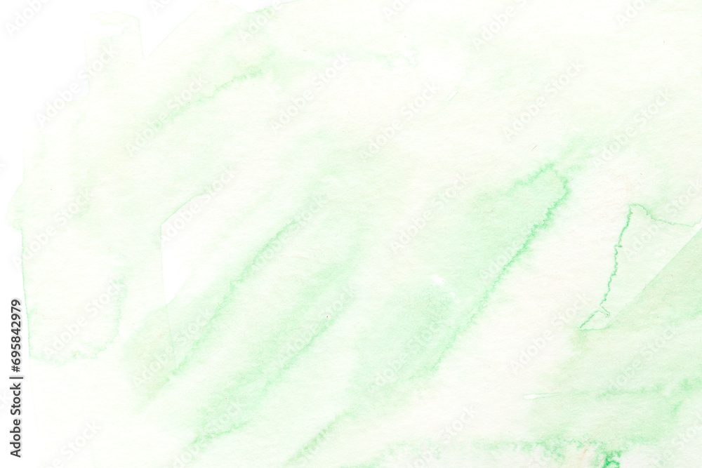 Abstract liquid art background. Green watercolor translucent blots on white paper.