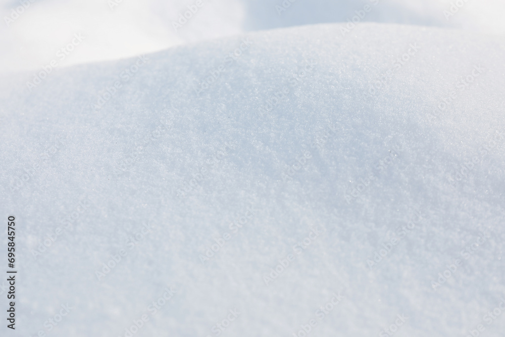 Clear white snow as background, closeup. Winter season