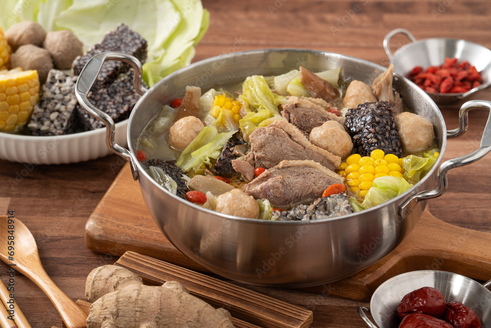 Delicious ginger duck hot pot soup with fresh vegetables in Taiwan.