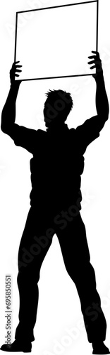 Protestor or demonstrator at a demonstration march, picket line or strike protest rally in silhouette. Holding up a banner or picket sign board placard.