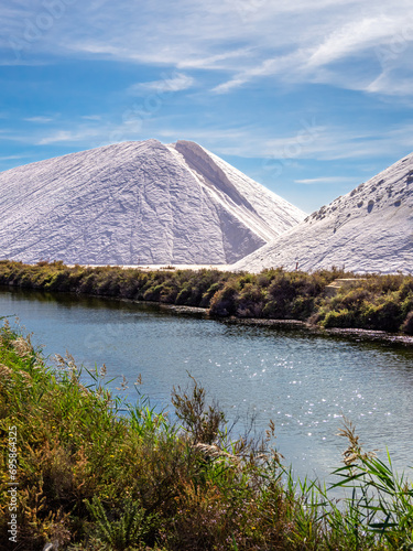 Salt piles-camels in the salworks of Aigues Mortes, France. photo