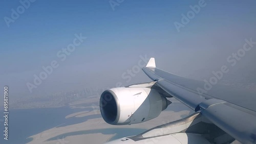 Wallpaper Mural Flying over the city of Dubai and its artificial islands with Airbus A340 Torontodigital.ca