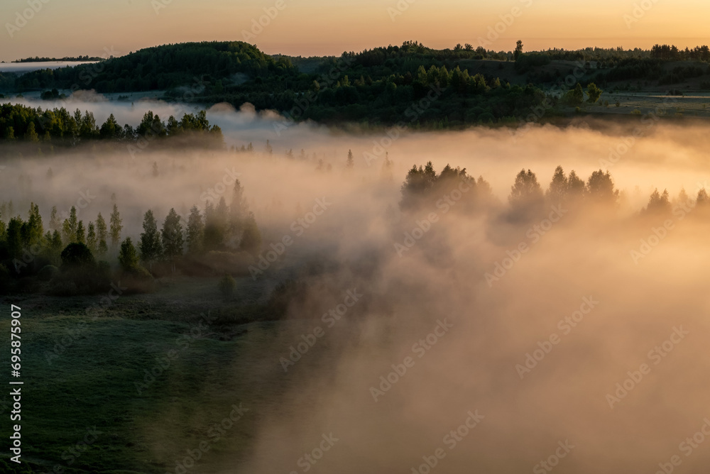 Foggy dawn in Izborsko-Malskaya Valley, Pskov region