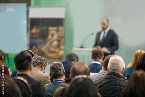 A vibrant space with passionate individuals gathered for a green energy seminar.