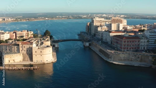 Overview of Taranto at dawn, with Aragonese Castle, swing bridge, old town, Mar Piccolo
