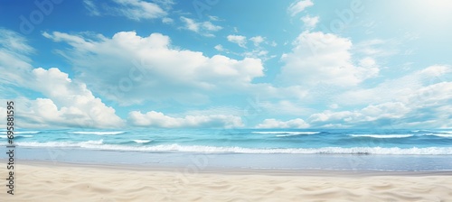 Idyllic Sandy Beach with Crystal Clear Turquoise Ocean Waves on a Serene and Sunny Day © Yuri