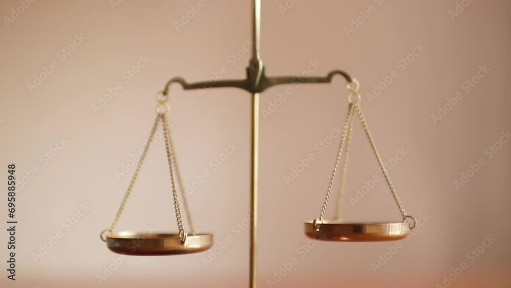 Golden justice scales in courtroom close up. Justice legal and jurisprudence concept. Golden justice scales in courtroom close up. Justice legal and jurisprudence concept.