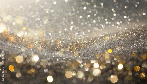 abstract glitter silver and gild lights background de focused