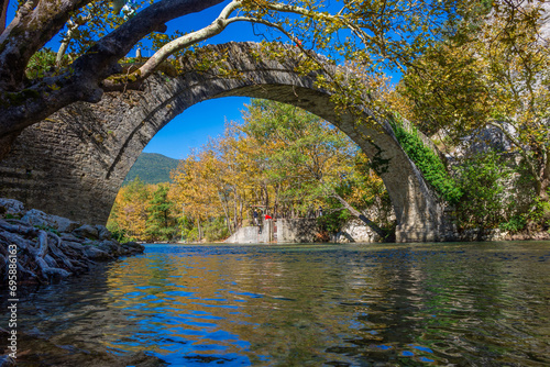 Beautiful Landscape view of the traditional stone bridge of Klidonia, Voidomatis river where the ravine of Vikos