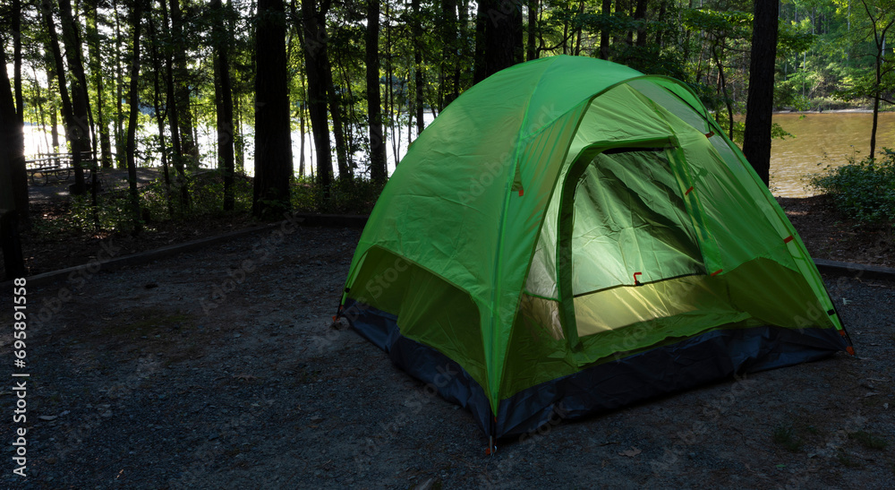 Lighted tent in the woods