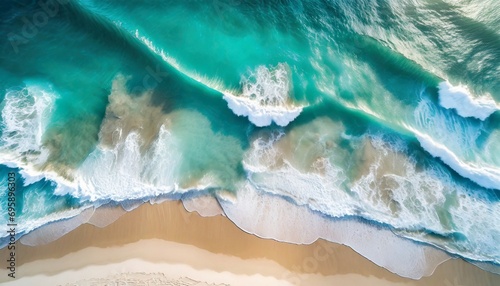 aerial top view of beautiful tropical white sand beach with wave foam and sea summer vacation and travel background with copy space top view from drone