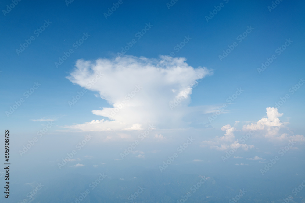 Obraz premium Aerial view of sky above the clouds