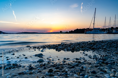Schöner Sonnenuntergang an der Küste von Kroatien in dem Ort Medulin bei Premantura photo
