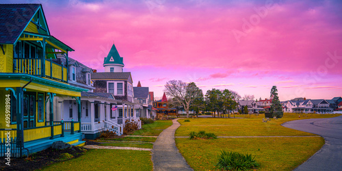Fototapeta Oak Bluffs skyline, well-preserved landmark houses, and dramatic winter sunset c