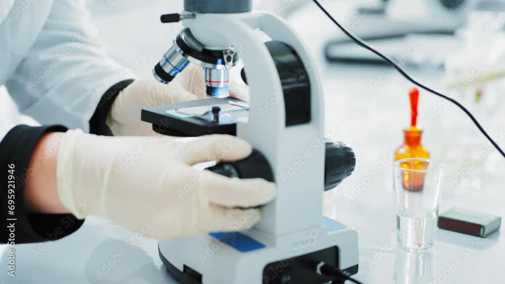 Scientists using microscope in Bio lab and experiment, Concept science and technology Scientists using microscope in Bio lab and experiment, Concept science and technology