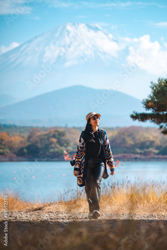Happy tourist traveler woma...