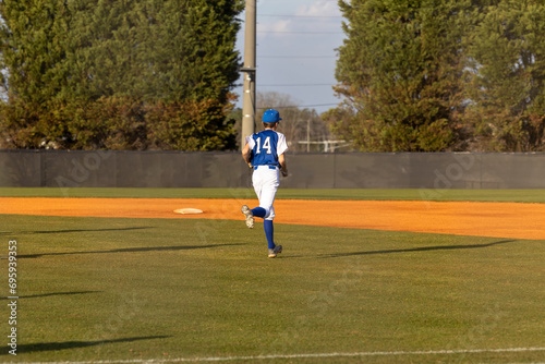 Photography Baseball Player Running to His Position