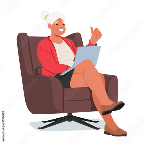 Elderly Woman, Joyfully Using A Laptop, Gives A Thumbs-up, Embracing Technology With A Smile That Reflects Satisfaction