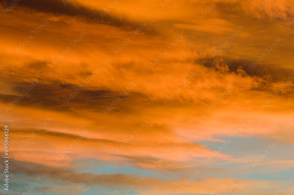 Very dramatic sunset clouds on the sky. Copy space for placement of text. Empty background teplate for designers.	